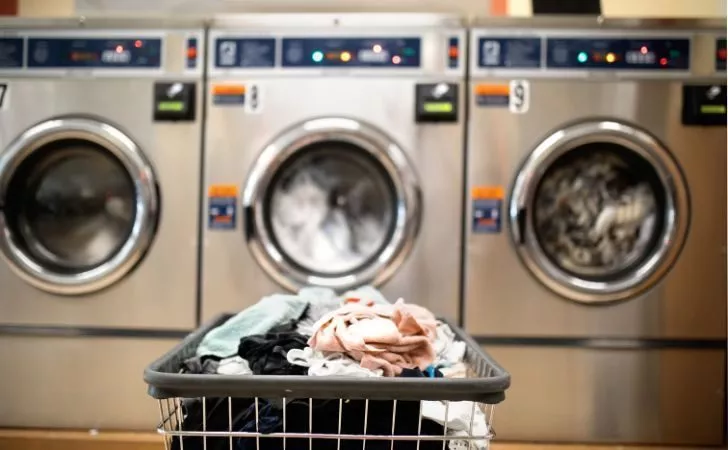 A basket of laundry at a laundromat