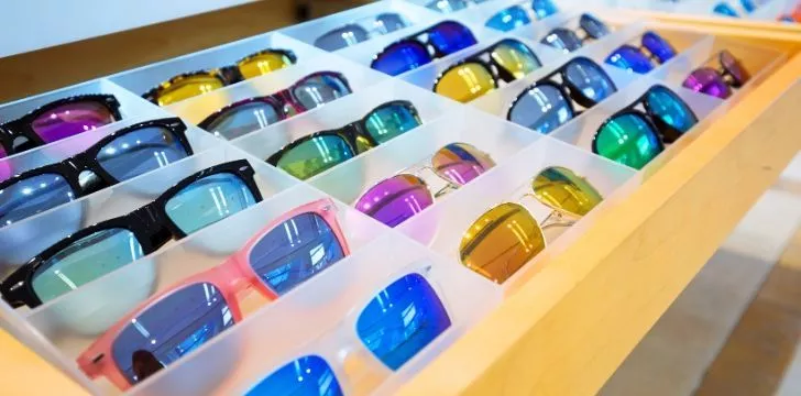 A tray of sunglasses in many colours