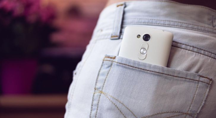Women's Jeans with a phone in her back pocket
