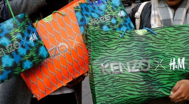Lots of vibrant Kenzo H&M shopping bags