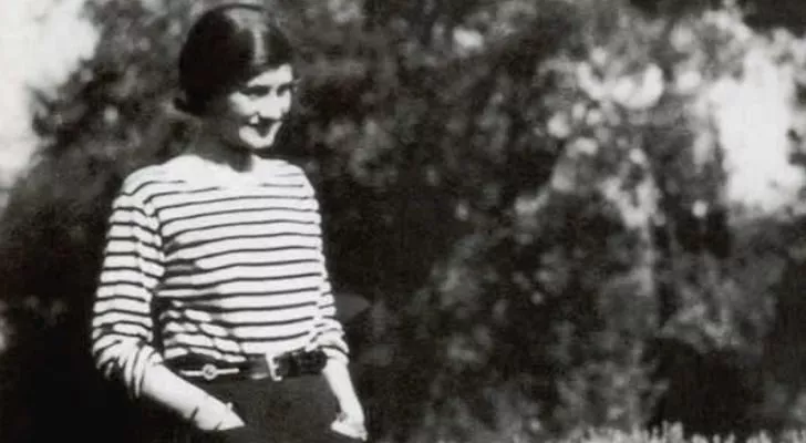 Coco Chanel wearing a striped Breton shirt